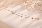 Starlit Dreams: Celestial Pearl & Star Layered Bracelet