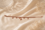 Whimsical Wonders: Rose Gold-Plated Celestial Charm Bracelet