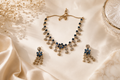Azure Blossom Radiance: 18k Gold-Plated Crystal Floral Necklace & Earring Set