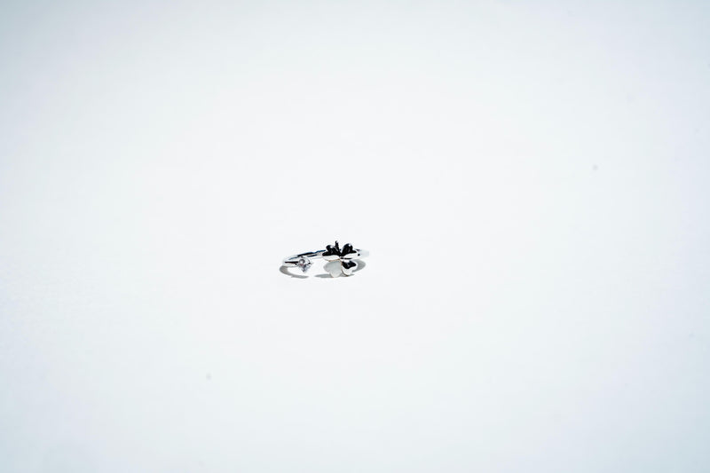 Fortune Bloom: The Lucky Clover Solitaire Ring