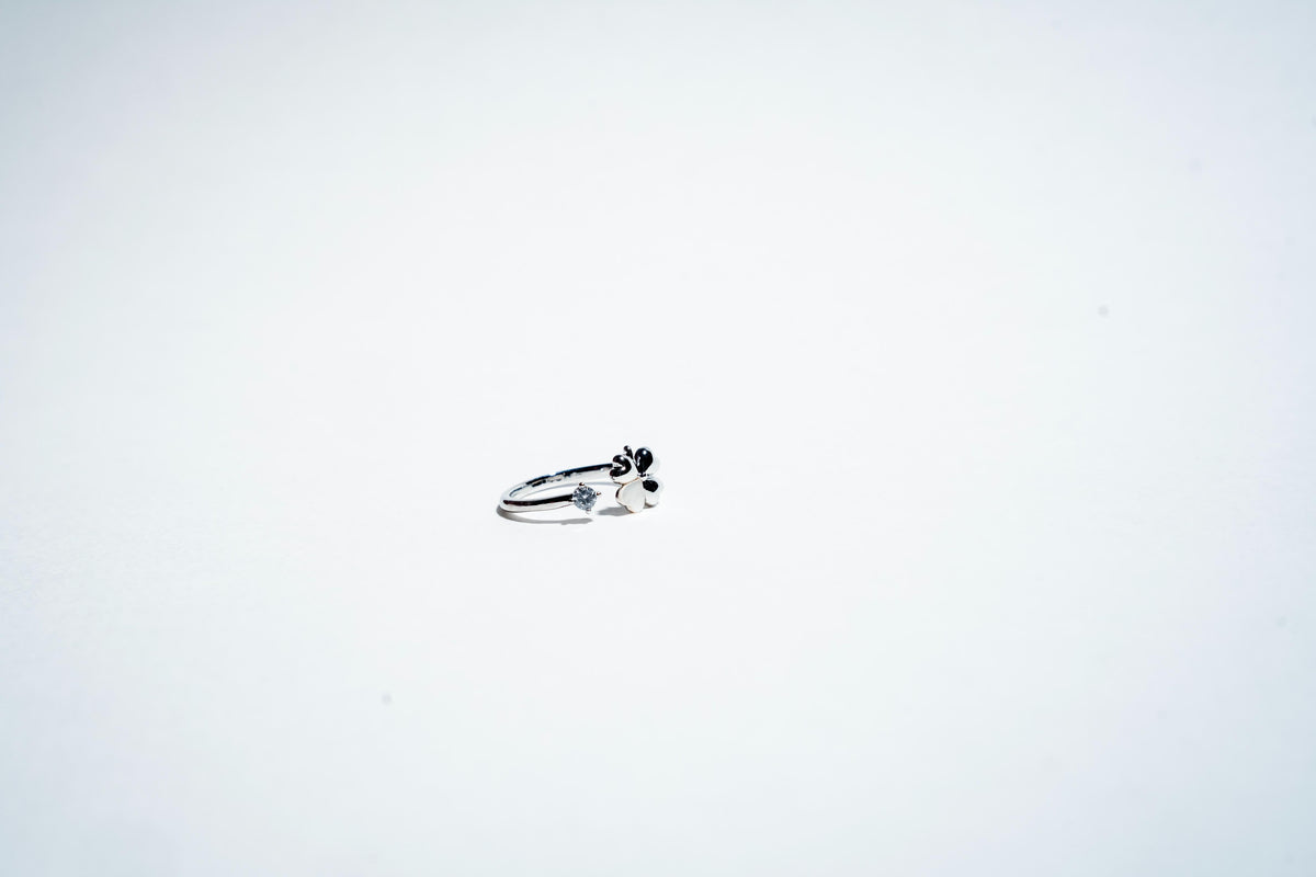 Fortune Bloom: The Lucky Clover Solitaire Ring