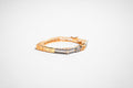 The Sovereign Tiered Pavilion Bangle – 18K Gold Plated